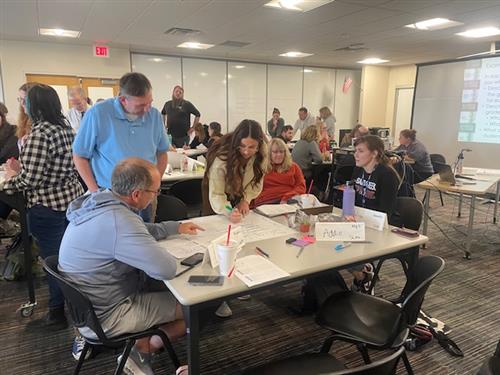 Math teachers working on task as a group
